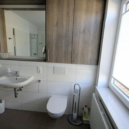 Grosse-ferienwohnung-3-mit-meerblick-und-strandkorb-im-haus-seeluft-duhnen アパート クックスハーフェン